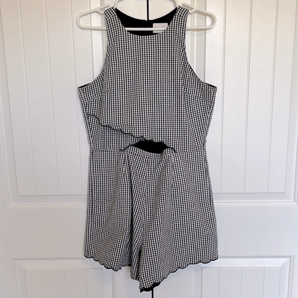 Size M Saylor 1 piece jumpsuit/shorts with pockets & back zipper.